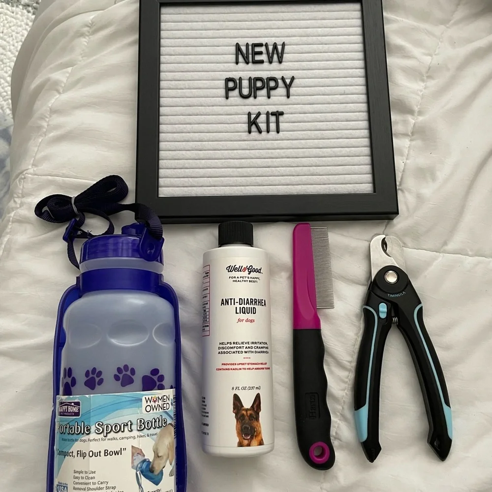 New puppy dog pet kit water bottle flea comb nail clippers antidiarrhea medicine